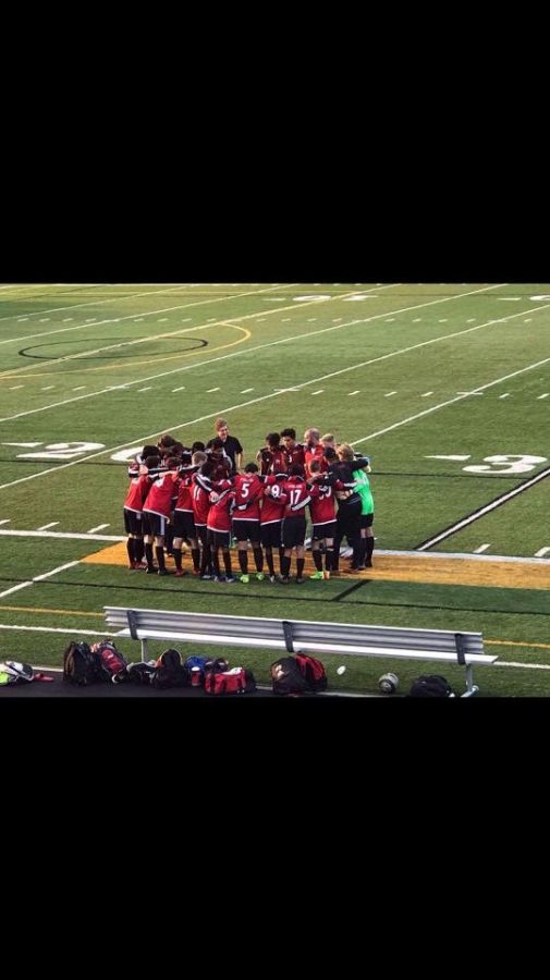 Huddle before the first game of the season